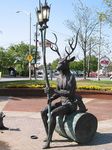  antlers buck cervine courtyard deer hooves horns lagomorph lamp log male nude photo rabbit real sitting solo statue 