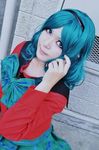 asian bishoujo_senshi_sailor_moon blue_hair cosplay kaiou_michiru_(cosplay) lowres photo real school_uniform 