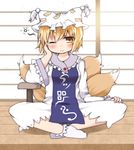  blonde_hair fox_tail hand_on_own_cheek hand_on_own_face hat highres indian_style multiple_tails nanana_(chicken_union) one_eye_closed sitting socks solo tail touhou white_legwear yakumo_ran yellow_eyes 