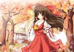  autumn autumn_leaves bad_id bad_pixiv_id bow brown_hair detached_sleeves dress hair_bow hair_tubes hakurei_reimu hakurei_shrine junna long_sleeves red_dress shrine solo touhou tree 