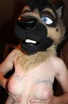  blue_eyes canine cupped_breast dog erin_middendorf female fursuit fursuit_head human looking_at_viewer nipples nude photo pose solo topless 