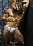  against_wall bulge feline lion male muscles photomorph solo standing underwear 