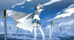  1girl armband armpits belt cape cloud day field_of_blades gloves highres magical_girl mahou_shoujo_madoka_magica miki_sayaka planted_sword planted_weapon short_hair sky smile solo sword thighhighs water weapon zettai_ryouiki 