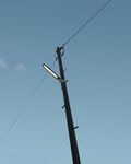  commentary_request lamppost mogg no_humans original power_lines sign sky star_(sky) telephone_pole twilight 