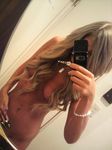  blonde_hair breasts ganguro long_hair panties panty_pull photo piercing real solo topless underwear 