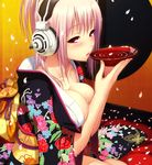  alcohol blush breasts cleavage cup floral_print headphones japanese_clothes kimono large_breasts long_hair nitroplus obi open_mouth petals pink_hair red_eyes sakazuki sake sash sitting solo super_sonico tsuji_santa 