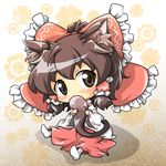  animal_ears cat_ears chibi hakurei_reimu kemonomimi_mode red_star_(toranecomet) solo tail tail_hug touhou 