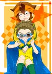  2boys annoyed blush brown_hair cape dreadlocks endou_mamoru eyes_closed goggles grimace hairlocs headband hug inazuma_eleven inazuma_eleven_(series) kidou_yuuto long_hair multiple_boys open_mouth red_eyes short_hair shorts shota sitting smile soccer_uniform sportswear uniform 