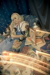  alice_margatroid blonde_hair book candle cosplay doll hitooomi photo solo touhou 