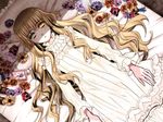  akira_(kaned_fools) bed brown_hair charlotte_bronte dress expressionless flower game_cg green_eyes heterochromia long_hair pillow shikkoku_no_sharnoth solo steampunk_(liarsoft) white_dress yellow_eyes 