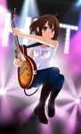  boots brown_eyes brown_hair clothes_writing denim earbuds earphones gibson guitar hair_ornament hairclip highres hirasawa_yui in-ear_earphones instrument jeans jumping k-on! knee_boots les_paul pants shirt short_hair solo spotlight stage t-shirt ultimate_ears zvuc 