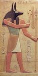  ancient_furry_art anubian_jackal anubis canine carving crook deity egyptian hieroglyphics jackal male mammal photo polearm real scepter sculpture solo staff stone unknown_artist 