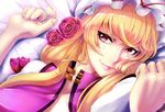  bed blonde_hair eyelashes face flower graphite_(medium) hands hat highres kosuke_(gonzo_2010) lips long_hair lying mixed_media on_back open_clothes purple_eyes rose smile solo touhou traditional_media unfastened yakumo_yukari 