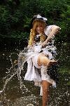  blonde_hair cosplay female hat highres k-a-n-a kirisame_marisa photo real touhou water 