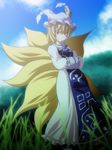  animal_ears bad_id bad_pixiv_id blonde_hair blush cloud day fox_tail grass hands_in_opposite_sleeves hat highres looking_at_viewer multiple_tails nature s-syogo short_hair sky smile solo tail touhou yakumo_ran yellow_eyes 