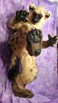  fursuit hindpaw hyena looking_at_viewer mammal pawpads paws photo real solo spots 