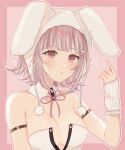  1girl :o animal_hood armlet bare_shoulders blunt_bangs blush border breasts brown_eyes brown_hair cleavage danganronpa_(series) danganronpa_2:_goodbye_despair detached_collar flipped_hair galaga hand_up highres hood ima_(kon_kon_5) large_breasts leotard medium_hair mole mole_on_breast nanami_chiaki neck_ribbon official_alternate_costume outline pink_border pink_ribbon rabbit_hood ribbon solo upper_body white_leotard white_outline 