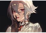  1girl arlecchino_(genshin_impact) black_background black_eyes commentary genshin_impact grey_hair grin highres jesse_(pixiv34586727) jewelry looking_at_viewer parted_lips portrait red_lips ring short_hair simple_background smile solo 