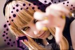  blonde_hair cosplay highres medusa_gorgon photo snake soul_eater witch yellow_eyes yellow_nails 