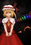  ascot bad_id bad_pixiv_id blonde_hair blouse dark_background fire flame flandre_scarlet hat highres laevatein light_smile mizuti red_eyes short_hair side_ponytail skirt solo touhou v_arms wings 