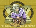  ahiru-kmo blonde_hair boots closed_eyes ivan_karelin jacket leg_hug letterman_jacket male_focus purple_jacket smile solo tiger_&amp;_bunny 