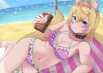  1girl :t alternate_costume animal_ear_fluff animal_ears bandaid bandaid_hair_ornament bikini blonde_hair blue_eyes blush breasts cleavage closed_mouth collarbone dog_ears dog_girl dog_tail foot_out_of_frame frilled_thigh_strap hair_between_eyes hair_ornament hairclip highres holding hololive horn_hairband long_hair looking_at_viewer lotion lying medium_breasts mococo_abyssgard multicolored_hair nail_polish naryuu_(like-af) pink_hair pink_nails polka_dot polka_dot_bikini pout sand solo sunscreen swimsuit tail thigh_strap toenail_polish toenails very_long_hair virtual_youtuber x_hair_ornament 