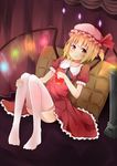  apple ascot bad_id bad_pixiv_id blonde_hair dress flandre_scarlet food frills fruit glowing hair_bobbles hair_ornament hat highres pillow r_star red_eyes ribbon sitting smile solo thighhighs touhou white_legwear wings zettai_ryouiki 
