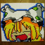  :d blonde_hair blush_stickers closed_eyes derivative_work fox_tail hat highres lego multiple_tails open_mouth photo pixel_art smile solo table tail touhou yakumo_ran you_rei_(blowback) 
