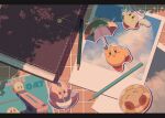  2-gou_(181poyo) book character_sticker clothes_pin colored_pencil commentary cupid_kirby halo highres kirby kirby_(series) no_humans parasol parasol_kirby pencil photo_(object) polaroid_photo shadow sticker symbol-only_commentary tree_shade umbrella wings 