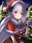  1girl :t alternate_costume belt black_belt black_bow black_gloves blunt_bangs blush bow bowtie brooch capelet christmas christmas_tree closed_mouth commentary_request cowboy_shot dress frown fur-trimmed_capelet fur-trimmed_dress fur-trimmed_headwear fur_trim gloves green_eyes grey_hair hand_up hat hat_bow heaven_burns_red highres holding holding_sack jewelry looking_at_viewer medium_hair night outdoors pom_pom_(clothes) purple_bow purple_bowtie red_capelet red_dress red_hat sack santa_costume santa_dress santa_hat sky solo star_(sky) starry_sky sugawara_chie twintails yu422yu 