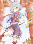  1girl animal_ear_fluff animal_ears autumn_leaves basket bishamonten's_pagoda black_skirt black_vest blue_capelet boots capelet closed_mouth commentary falling_leaves fold-over_boots grey_hair gumi_(fwjn7284) highres holding holding_with_tail jewelry leaf leg_up looking_at_viewer maple_leaf mouse_(animal) mouse_ears mouse_girl mouse_tail nazrin necklace pendant prehensile_tail red_boots red_scarf ribbon-trimmed_skirt ribbon_trim scarf shirt skirt smile solo tail touhou vest white_shirt 