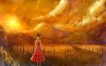  bare_arms black_eyes black_hair camera cloud cloudy_sky commentary_request dress floral_print holding holding_camera mountainous_horizon original red_dress sakimori_(hououbds) scenery short_hair sky smile solo standing wheat yellow_sky 