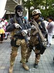  2boys assault_rifle balaclava call_of_duty call_of_duty:_modern_warfare_2 comiket cosplay ghost_(modern_warfare_2) gun helmet military multiple_boys photo rifle standing sunglasses weapon 