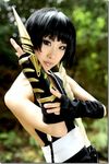  asian backless_shirt black_hair black_shirt bleach claw claws cosplay female fingerless_gloves gloves hair_wrap outdoors photo shirt short_hair solo sui-feng twintails weapon 