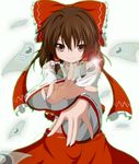  bow brown_eyes brown_hair detached_sleeves dr._cryptoso fingernails hair_bow hair_tubes hakurei_reimu highres lens_flare nail_polish ofuda smirk solo touhou yin_yang 