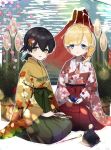  1boy 2girls bamboo bangs black_hair blonde_hair blue_eyes blue_ribbon blunt_bangs brown_eyes checkered checkered_kimono closed_fan commentary_request eggplant eyebrows_visible_through_hair fan floral_print folded_ponytail folding_fan full_body giantess green_hakama green_kimono hair_ornament hair_ribbon hakama highres japanese_clothes kantai_collection kasuga_maru_(kantai_collection) kimono kotoyoro long_hair mount_fuji multiple_girls new_year pipe red_hakama ribbon seiza shin&#039;you_(kantai_collection) side_ponytail sitting swept_bangs taiyou_(kantai_collection) volcano yamashiki_(orca_buteo) 