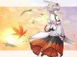  animal_ears black_skirt citolo detached_sleeves feathers from_behind hat inubashiri_momiji leaf long_skirt maple_leaf print_skirt red_skirt shield short_hair skirt solo sword tail tokin_hat touhou weapon wolf_ears wolf_tail 