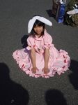  animal_ears bunny_ears carrot child cosplay dress inaba_tewi kneeling non-web_source photo solo touhou 