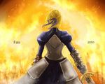  armor armored_dress artoria_pendragon_(all) bad_id bad_pixiv_id blonde_hair copyright_name dress excalibur fate/stay_night fate/zero fate_(series) faulds fire from_behind gauntlets hair_ribbon ribbon ririko_deluxe saber solo sword weapon 