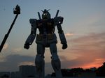  glowing glowing_eyes gundam highres japan mecha model outdoors photo rx-78-2 sunset 