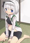  amaa_(chou_dennou_jidai) bad_id bad_pixiv_id barefoot bike_shorts black_hairband blue_eyes blush bow dress_shirt hair_bow hairband highres konpaku_youmu midriff navel open_clothes open_shirt shirt short_hair silver_hair sitting solo sports_bra tatami touhou vest wariza 