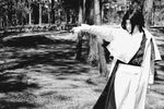  asian black_eyes black_hair cape coat cosplay cravat gloves grass kagami_shinnosuke last_blade last_blade_2 long_coat longcoat monochrome philippines sword tree watermark weapon 