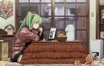  cat computer domo1220 eating food fruit green_eyes green_hair hanten_(clothes) hatsune_miku highres holding holding_food holding_fruit kotatsu laptop long_hair mandarin_orange niconico profile sitting sweater table television twintails very_long_hair vocaloid 