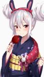  1girl animal_ears azur_lane bangs blue_kimono blush bunny_ears candy_apple closed_mouth commentary_request double_bun eyebrows_visible_through_hair floral_print food grey_background hair_between_eyes hairband highres holding holding_food japanese_clothes kimono kohakope laffey_(azur_lane) long_sleeves obi pinching_sleeves print_kimono red_eyes red_hairband sash side_bun sidelocks silver_hair smile solo upper_body wide_sleeves 