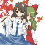  artist_request blush cosplay costume_switch hair_grab hair_tubes hakurei_reimu hakurei_reimu_(cosplay) kochiya_sanae kochiya_sanae_(cosplay) leaf multiple_girls one_eye_closed touhou 