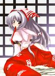  bangs blush fujiwara_no_mokou looking_back mouth_hold nanpuu panties solo touhou underwear undressing white_hair 