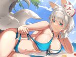  1girl animal_ear_fluff animal_ears azur_lane beach bikini blue_bikini blue_eyes breasts eyebrows_visible_through_hair fox_ears fox_mask fox_tail highres kaga_(azur_lane) kaga_(everlasting_killing_stone)_(azur_lane) kitsune large_breasts large_tail looking_at_viewer mask mask_on_head multiple_tails official_alternate_costume outdoors palm_tree penggan short_hair solo summer swimsuit tail tree water white_hair white_tail 