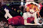  :o blonde_hair christmas doily flandre_scarlet hat looking_at_viewer lying merry_christmas on_stomach puffy_sleeves red_eyes short_hair short_sleeves side_ponytail skirt skirt_set snow snowflakes solo touhou wings yrzirst 
