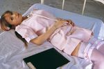  bed cosplay garter_belt garters nakagawa_shoko nurse nurse_uniform photo stethoscope thigh-highs thighhighs 