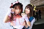  asahina_mikuru breast_grab breasts cosplay grabbing photo saya saya_(cosplayer) suzumiya_haruhi suzumiya_haruhi_no_yuuutsu 